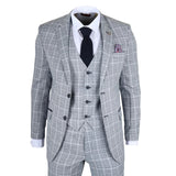 Gray checkered suit with a white shirt, black tie, and pocket square on a white background